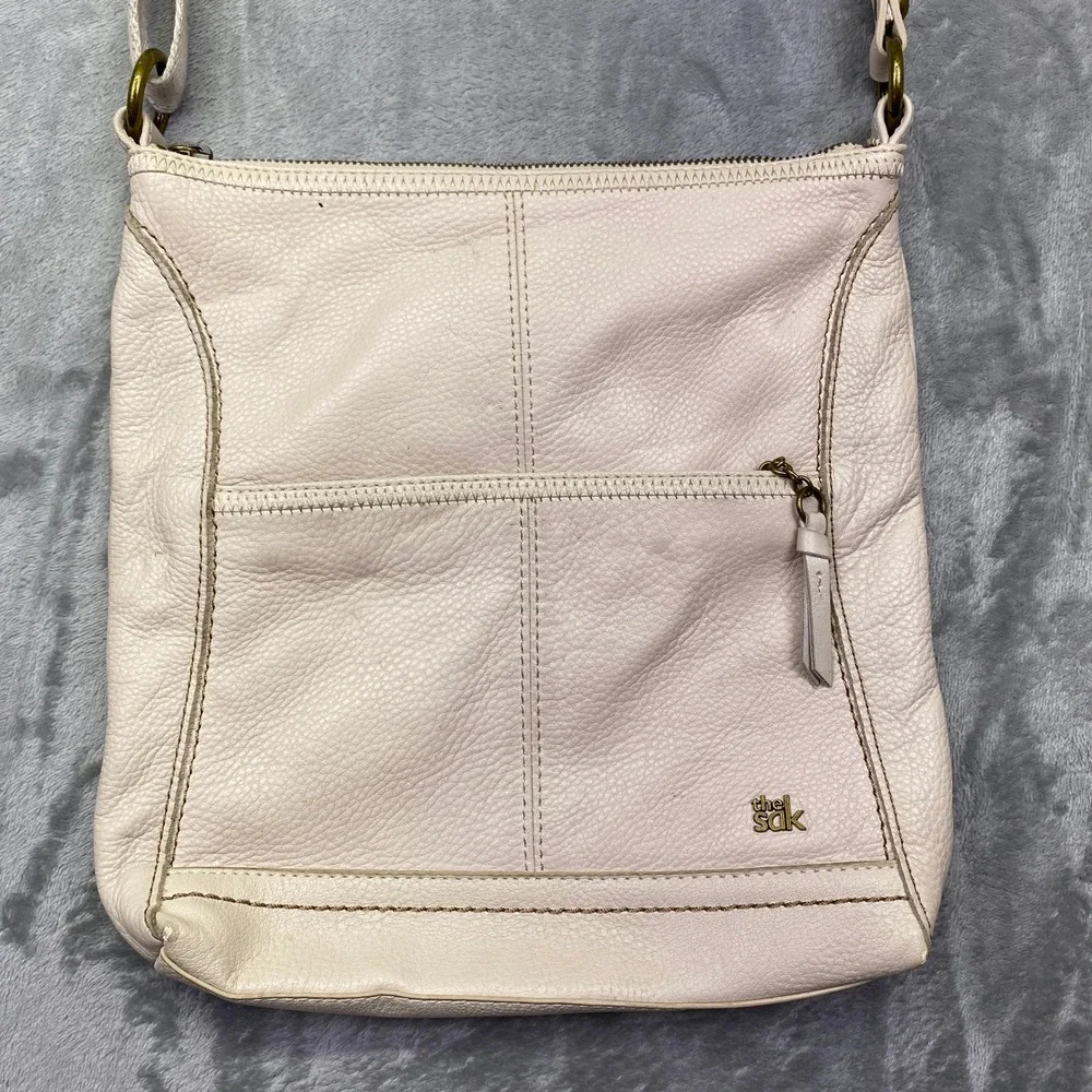 The Sak Pale Pink Leather Crossbody Bag Flap Zip Pockets Adjustable Strap‎